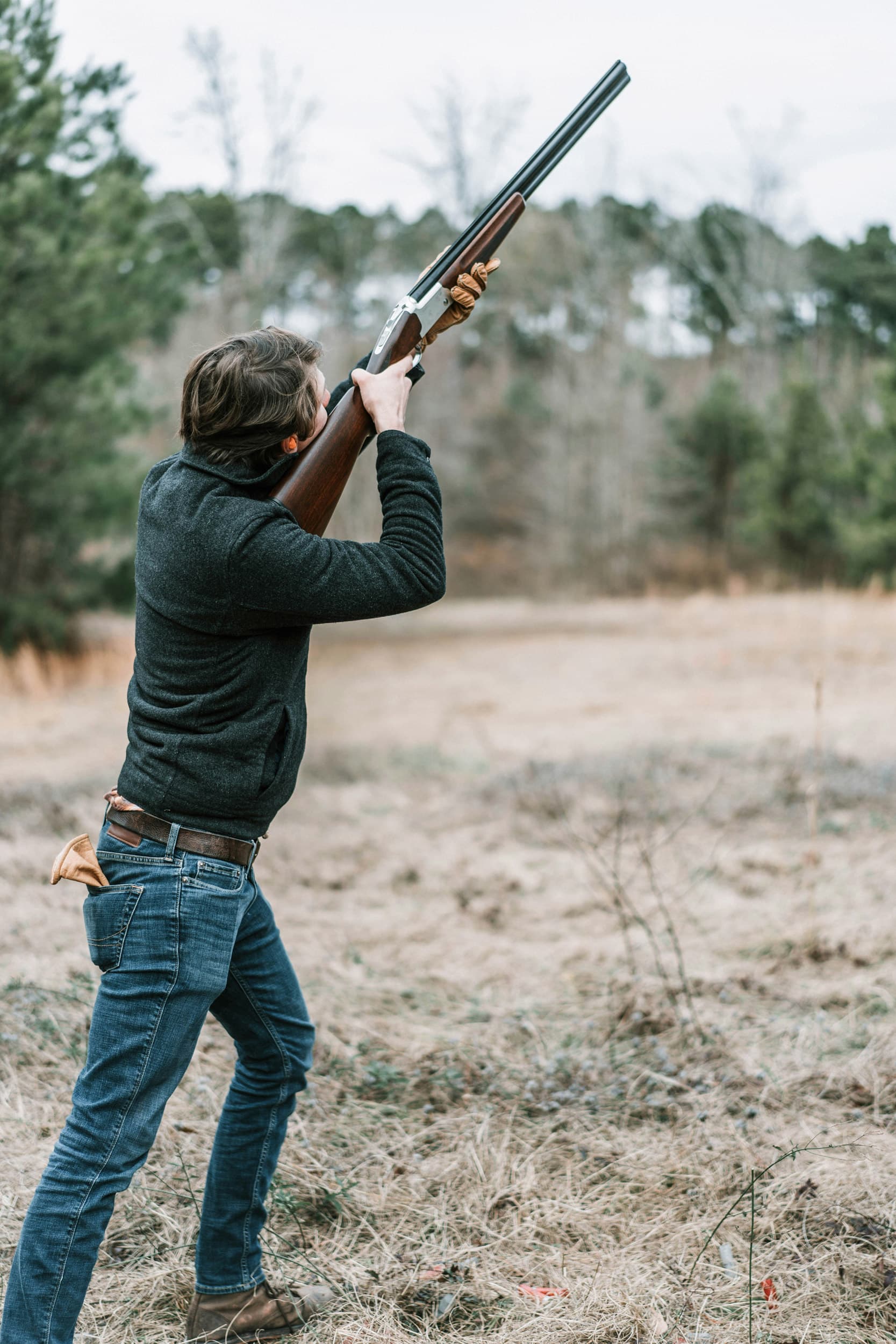 Man practicing during the shooting experience in Winter.