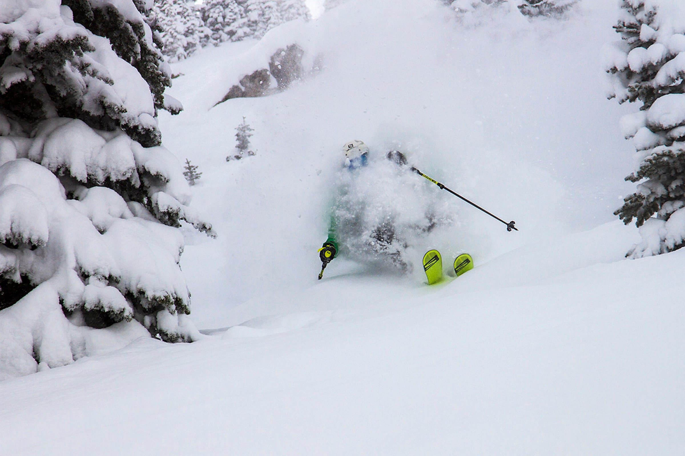 A skier going through deep powder at Jackson Hole Mountain Resort