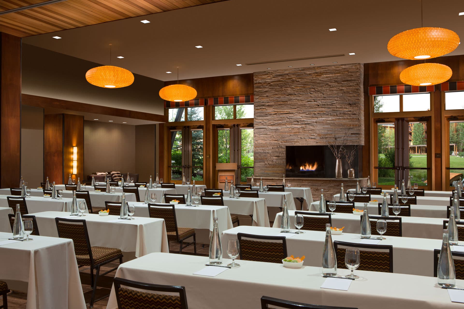 The Murie Ballroom with a meeting room set with white table cloths at Hotel Terra Jackson Hole, Wyoming.