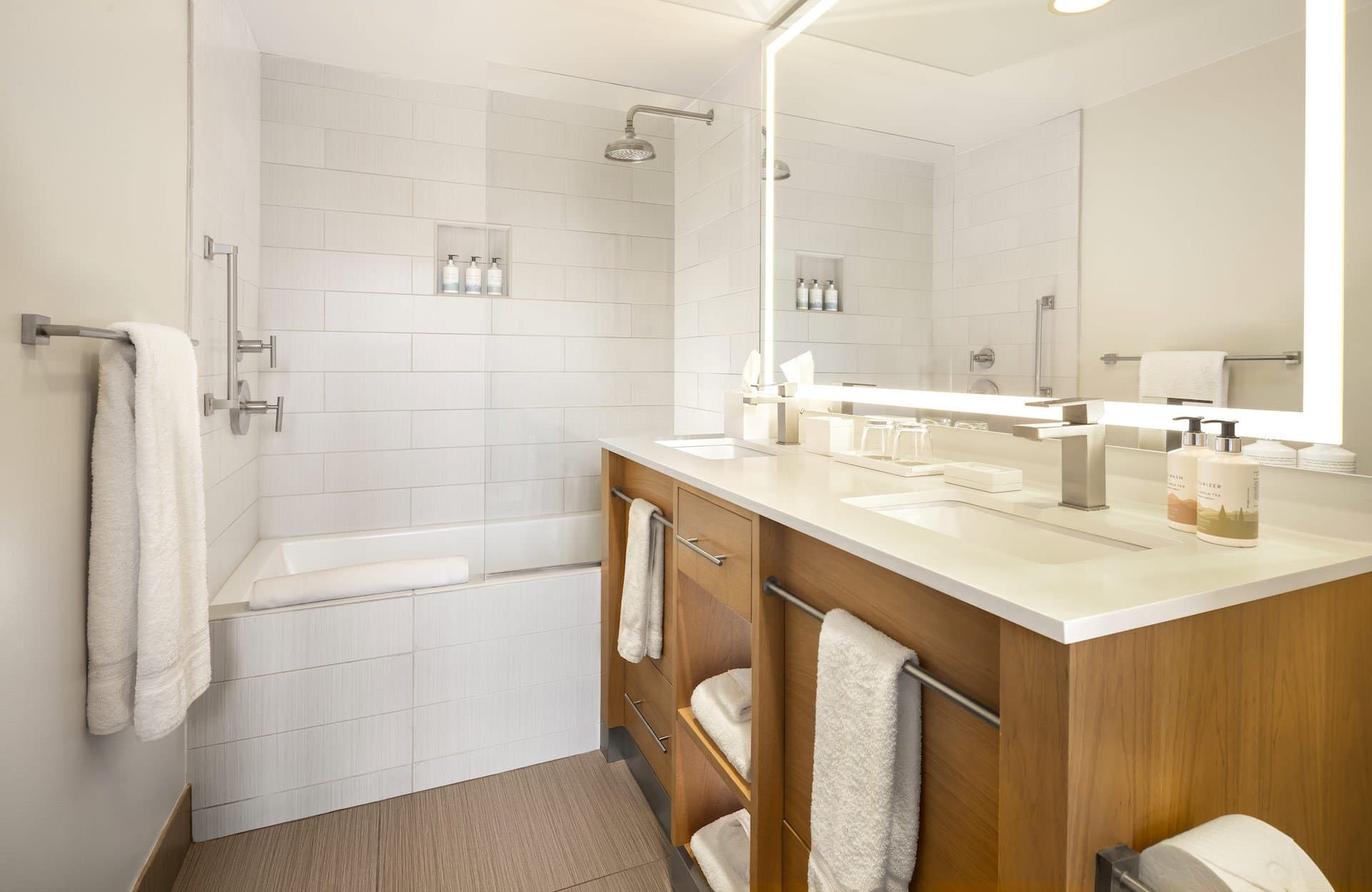Double sink and tub washroom at Terra Hotel