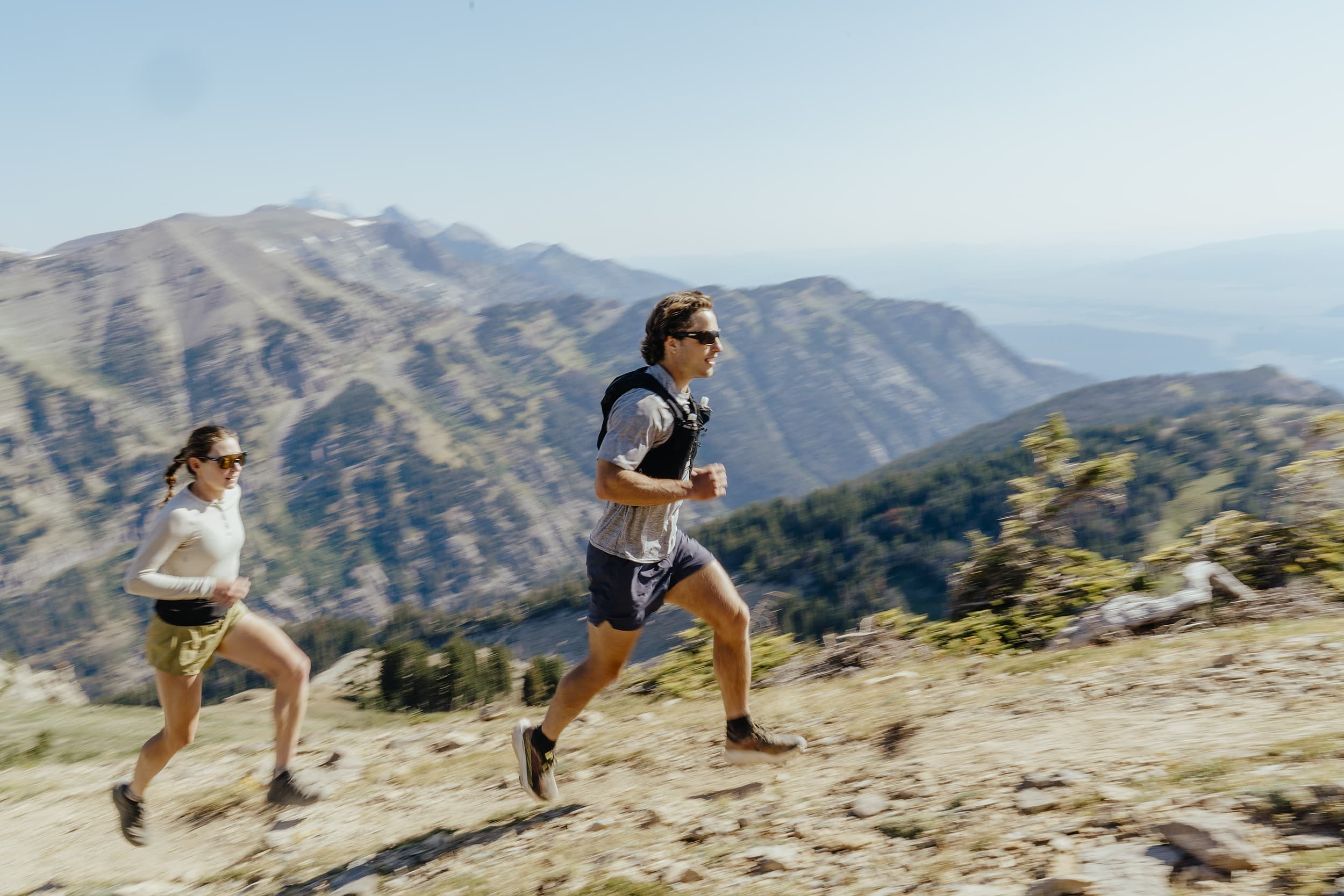 Trail runners on a mountain ridge near Hotel Terra Jackson Hole
