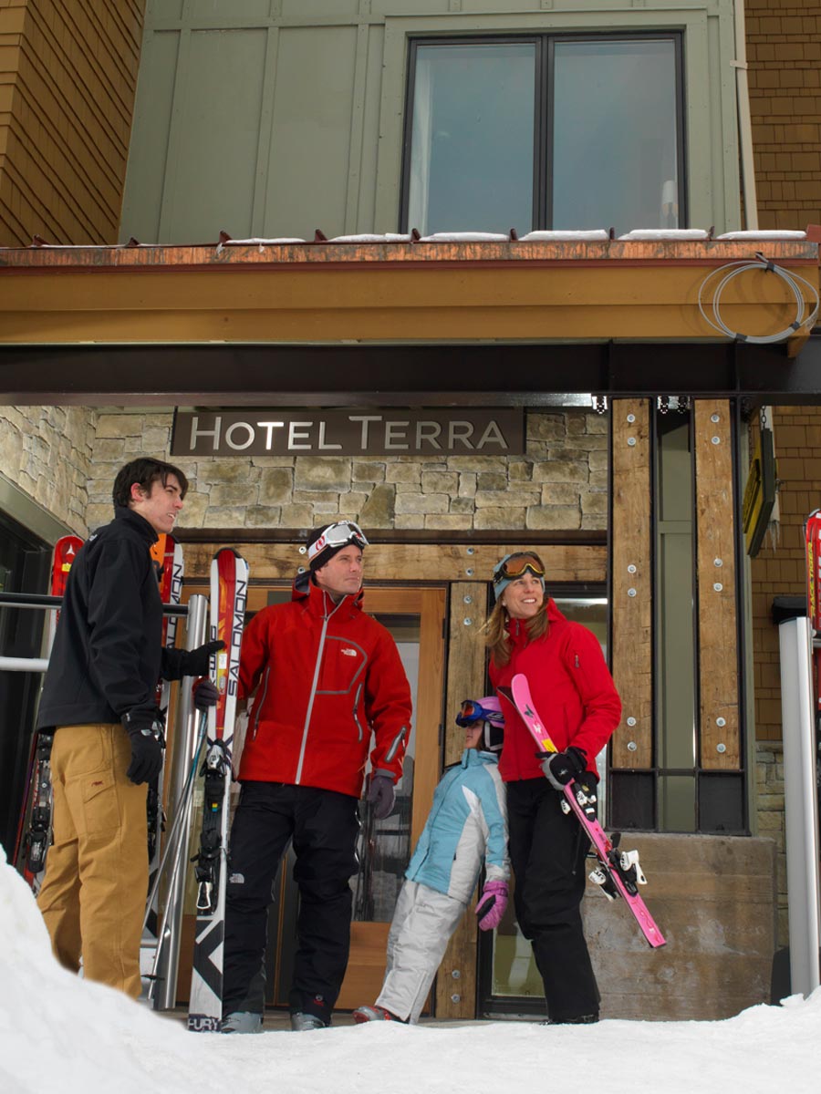 skiers in front of Hotel Terra