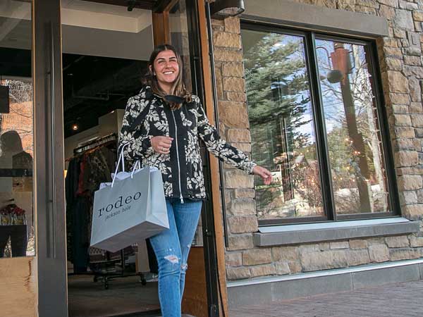 Shopper coming out of the Rodeo store.